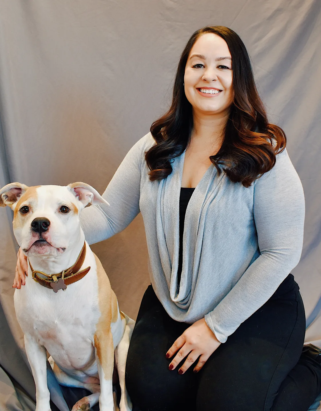 Brittany sitting with a dog Brittany sitting with a dog