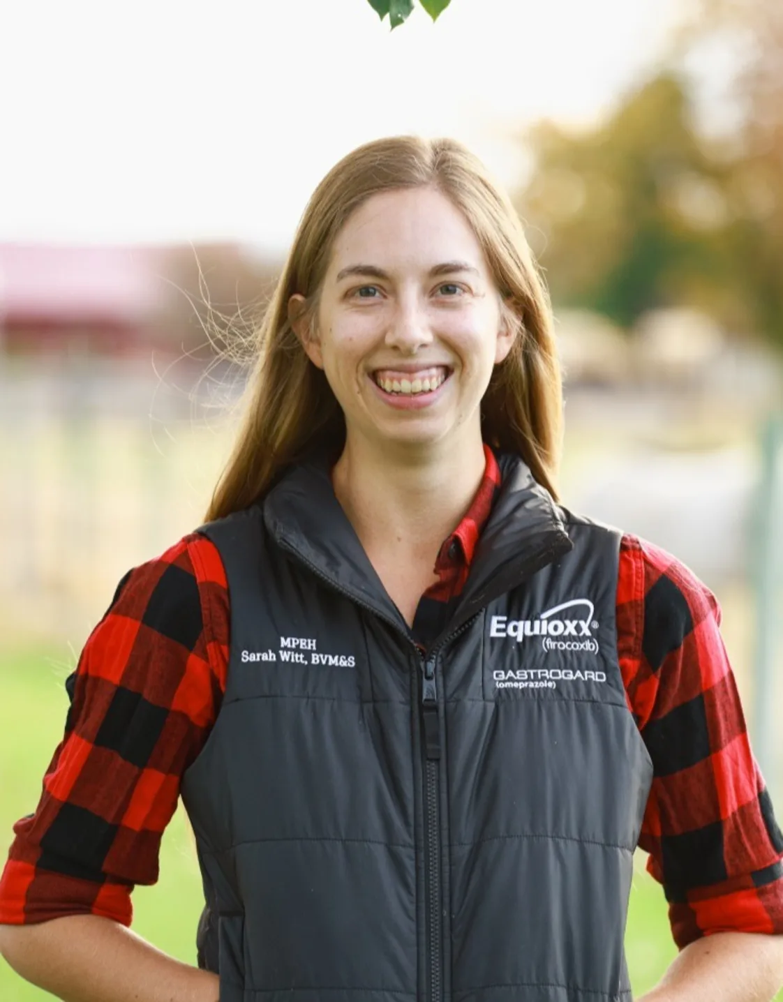 Dr. Sarah Witt with a white horse Dr. Sarah Witt with a white horse