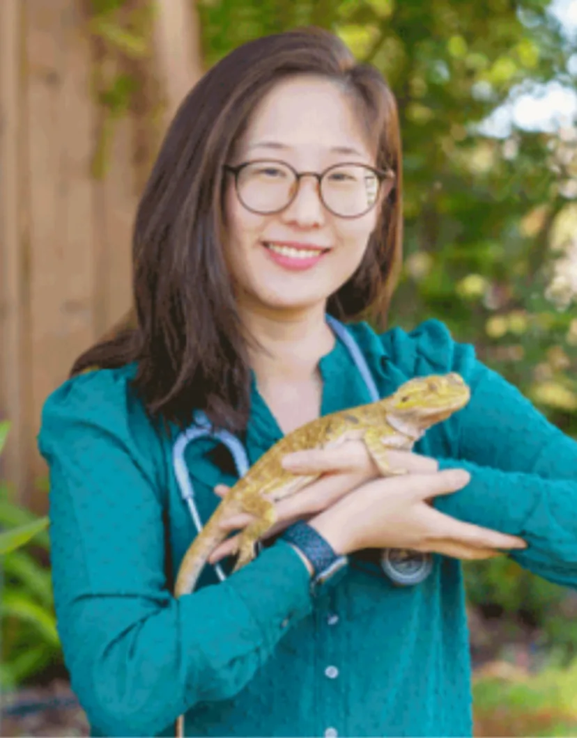 Youna Jeon holding a reptile