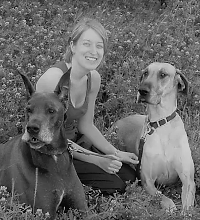 Dr. Kristin Strelec with two dogs Dr. Kristin Strelec with two dogs