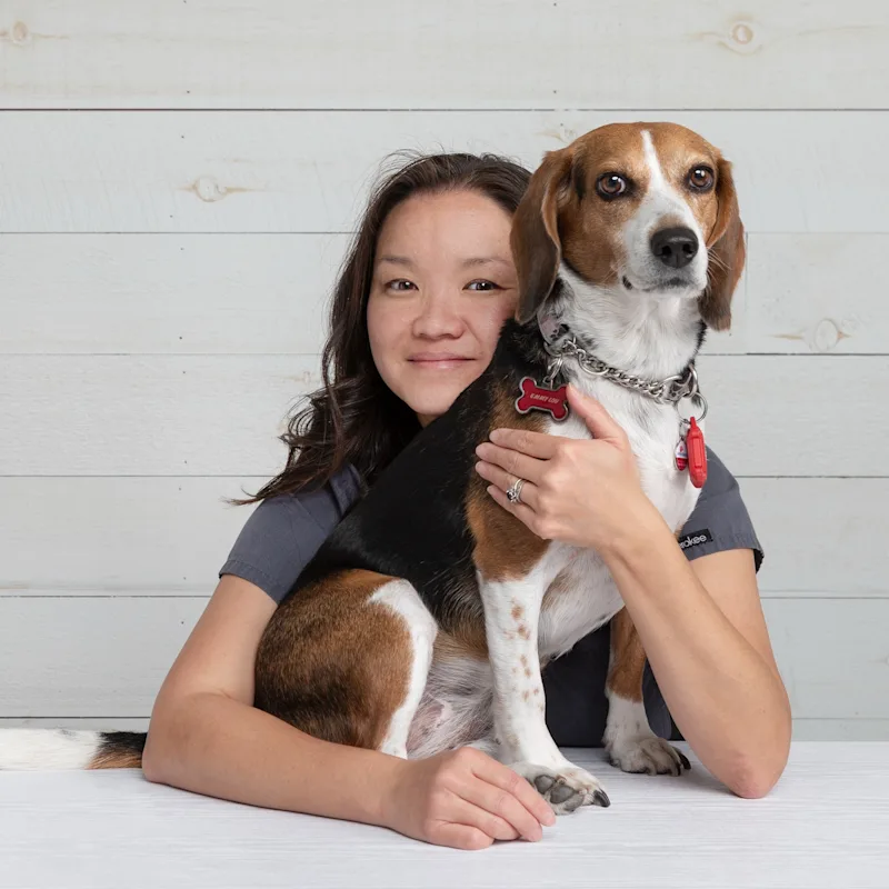Dr. Che Ng with dog Dr. Che Ng with dog