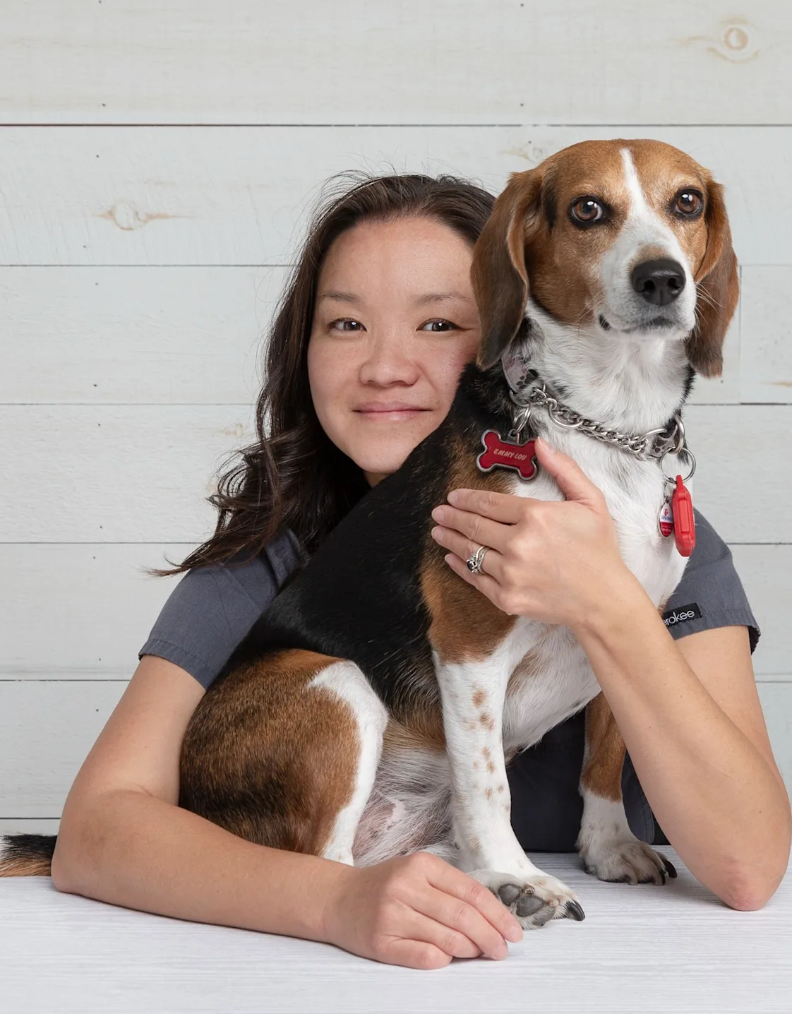Dr. Che Ng with dog Dr. Che Ng with dog