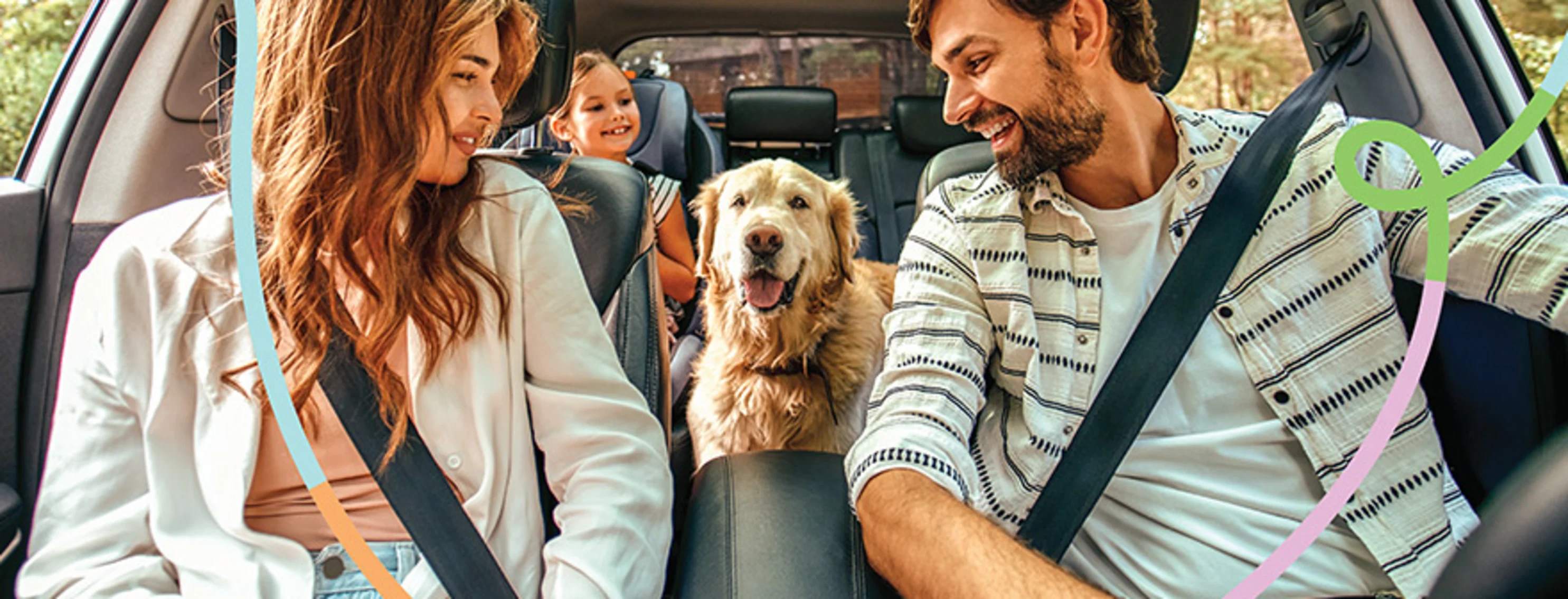 A family and dog sitting in the car seemingly ready for a drive. A family and dog sitting in the car seemingly ready for a drive.