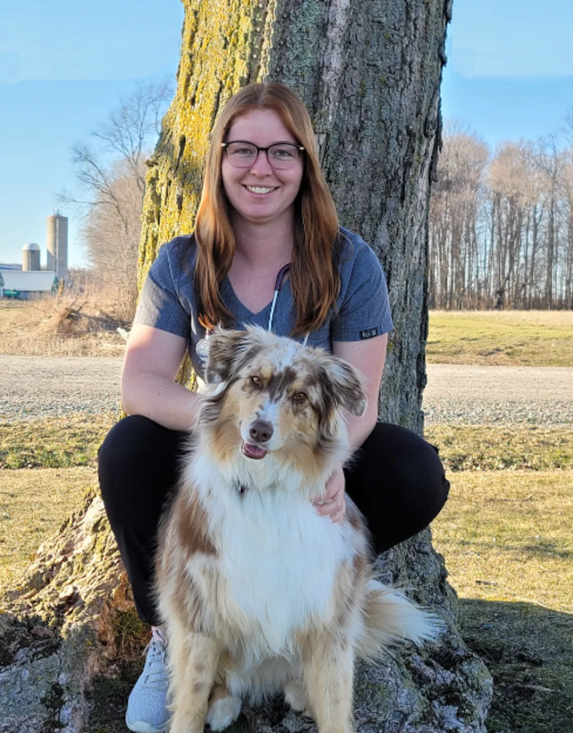 Headshot of Wendy with shepherd dog Headshot of Wendy with shepherd dog