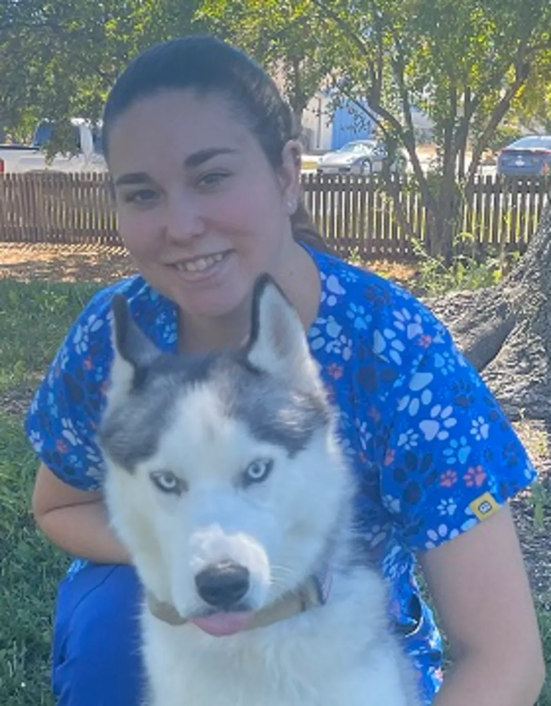 Crystal holding onto a husky. Crystal holding onto a husky.