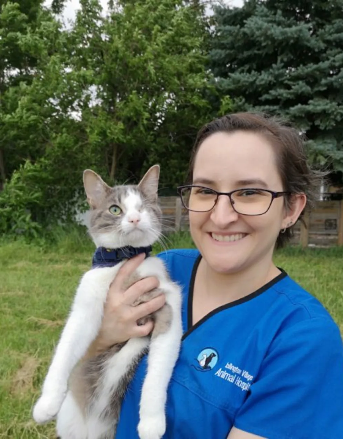 Andrea holding a small cat Andrea holding a small cat