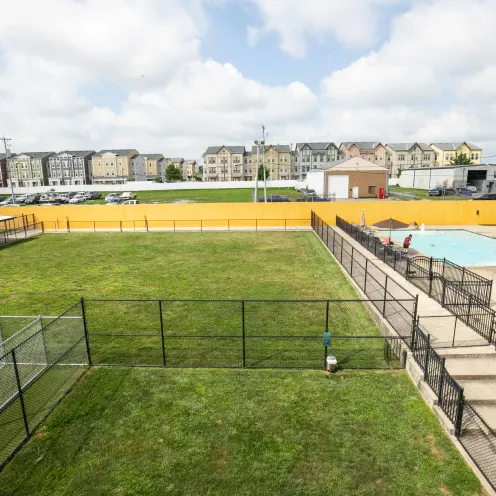 Uptown Hounds Aerial Shot showcasing the large playground area for your dogs.  It also has a separate pool area that is gated.