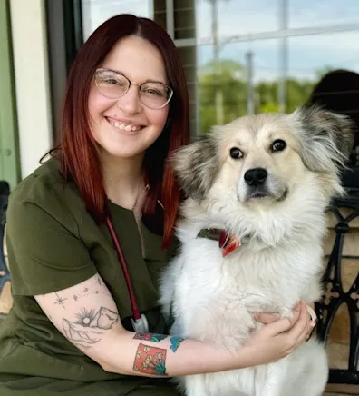 Allie Moyern with a white dog Allie Moyern with a white dog