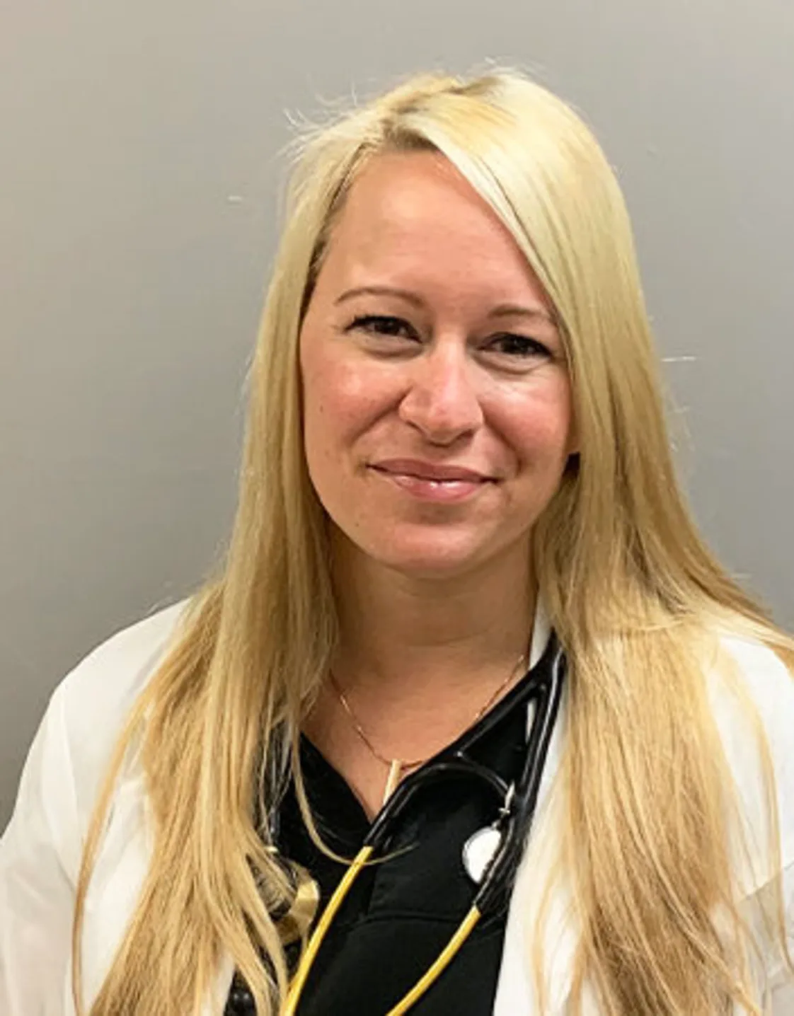 Kerri Wiedmeyer smiling for a photo. Kerri Wiedmeyer smiling for a photo.