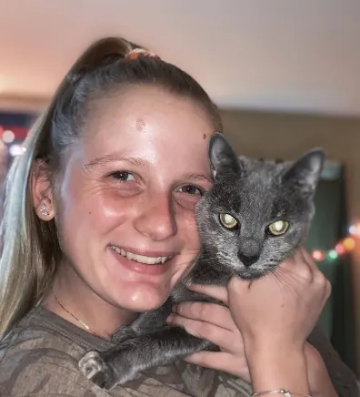 Lexi with a grey cat