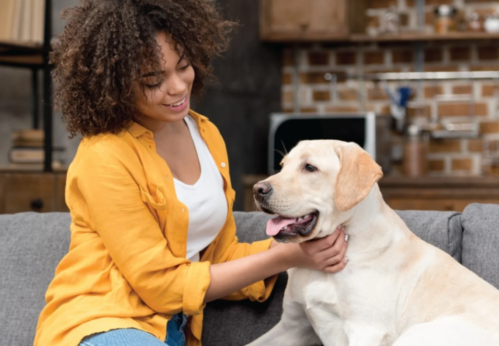 Woman with Dog on Couch Woman with Dog on Couch