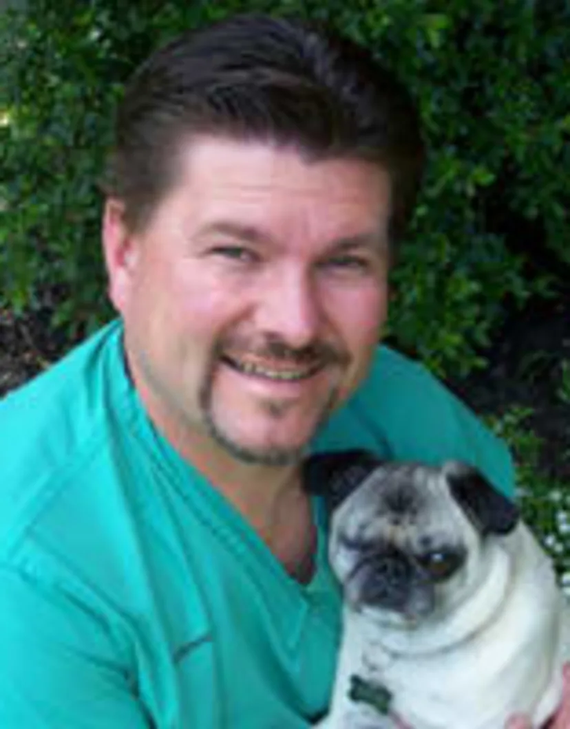 Dr. Michael Slawienski WITH A DOG