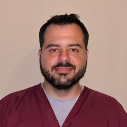 Dr. Carlos Olivares' staff photo from St. Francis of Assisi Veterinary Medical Center