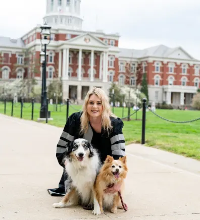 Dr. Lexi Crull with 2 dogs Dr. Lexi Crull with 2 dogs