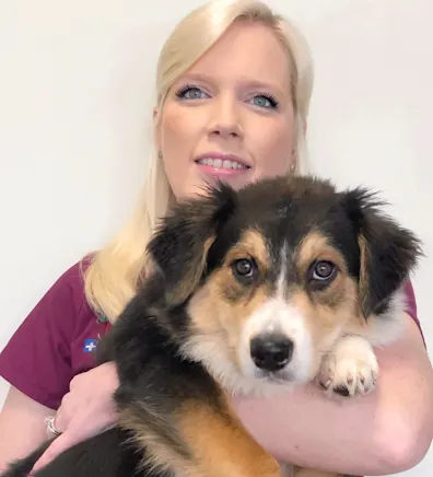Brandi at Clocktower Animal Hospital, with dog Brandi at Clocktower Animal Hospital, with dog