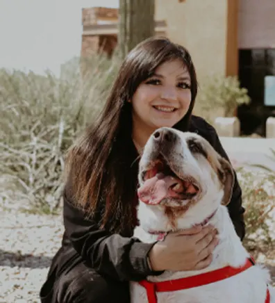 Aubrey Marquez with tan and white dog Aubrey Marquez with tan and white dog