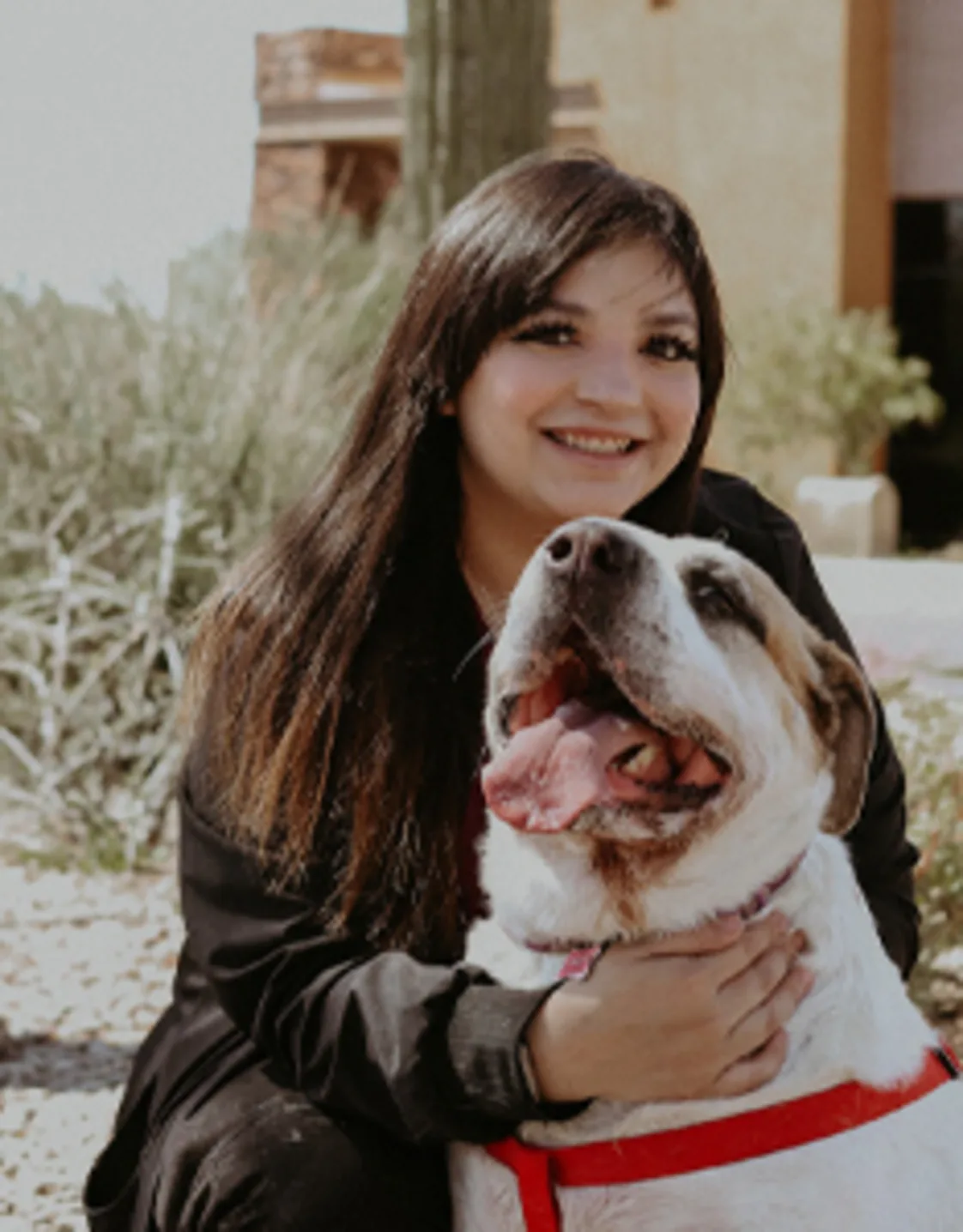 Aubrey Marquez with tan and white dog Aubrey Marquez with tan and white dog