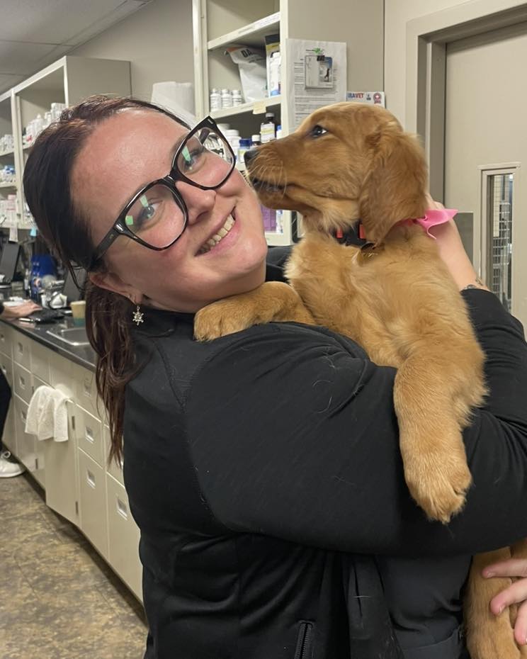 Team Member with Happy Pet