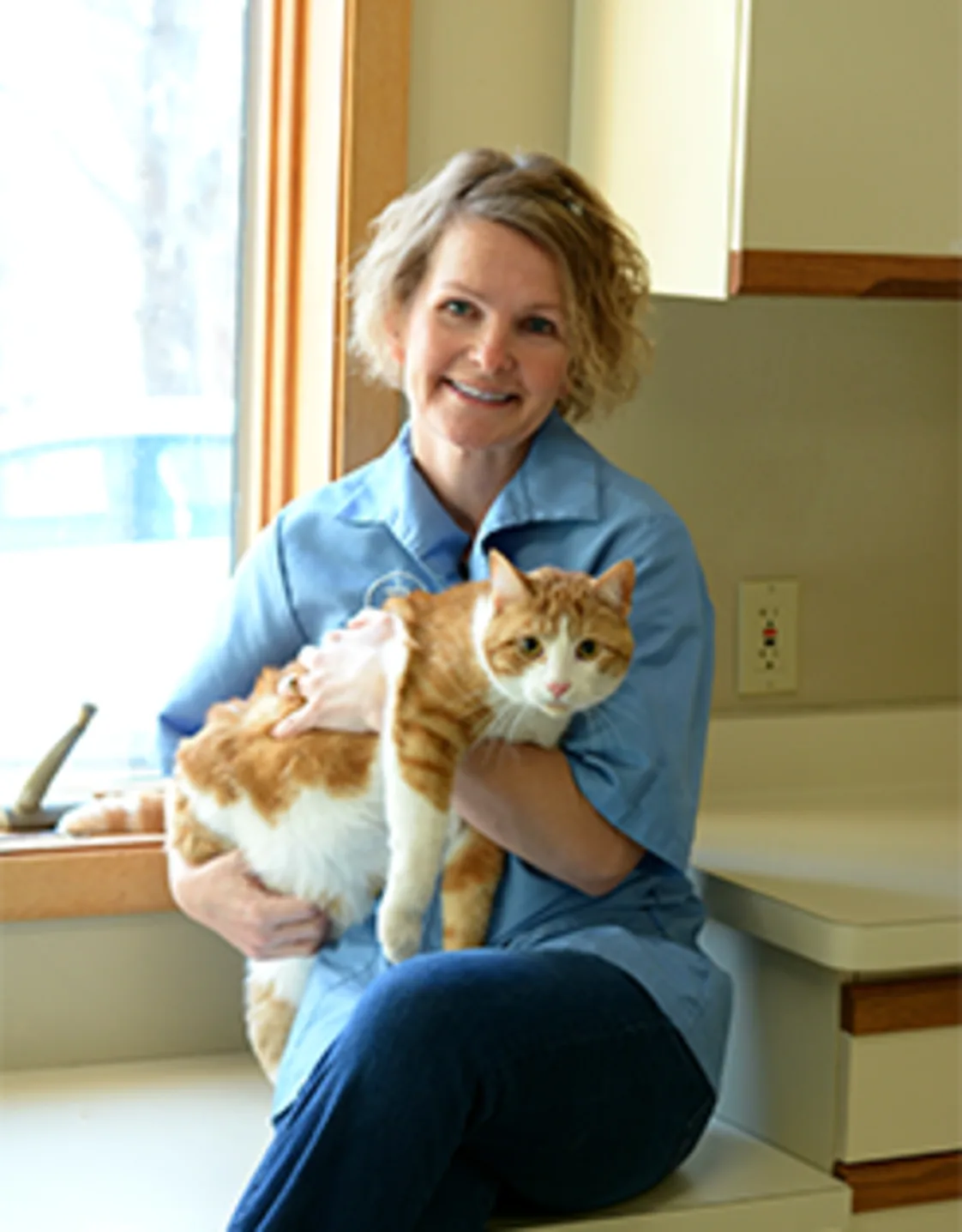 Dr. Sherry Aardsma holding cat Dr. Sherry Aardsma holding cat