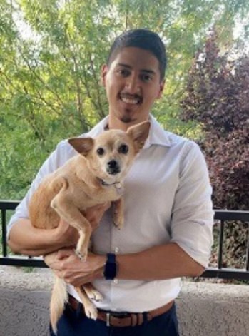 Dr. Mendez  holding dog