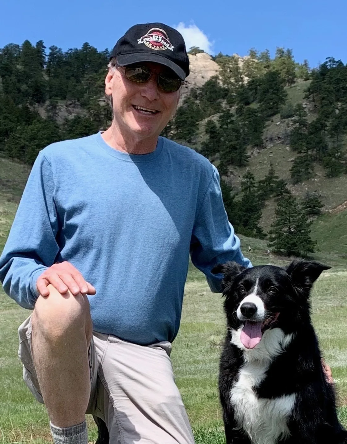 Andrew Berman with black and white border collie Andrew Berman with black and white border collie
