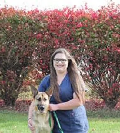 Alexis Julian with a dog Alexis Julian with a dog