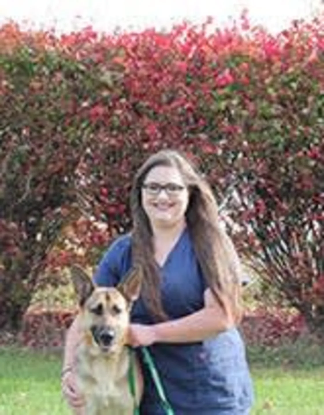 Alexis Julian with a dog Alexis Julian with a dog