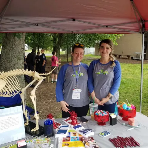 Two staff members at an event 