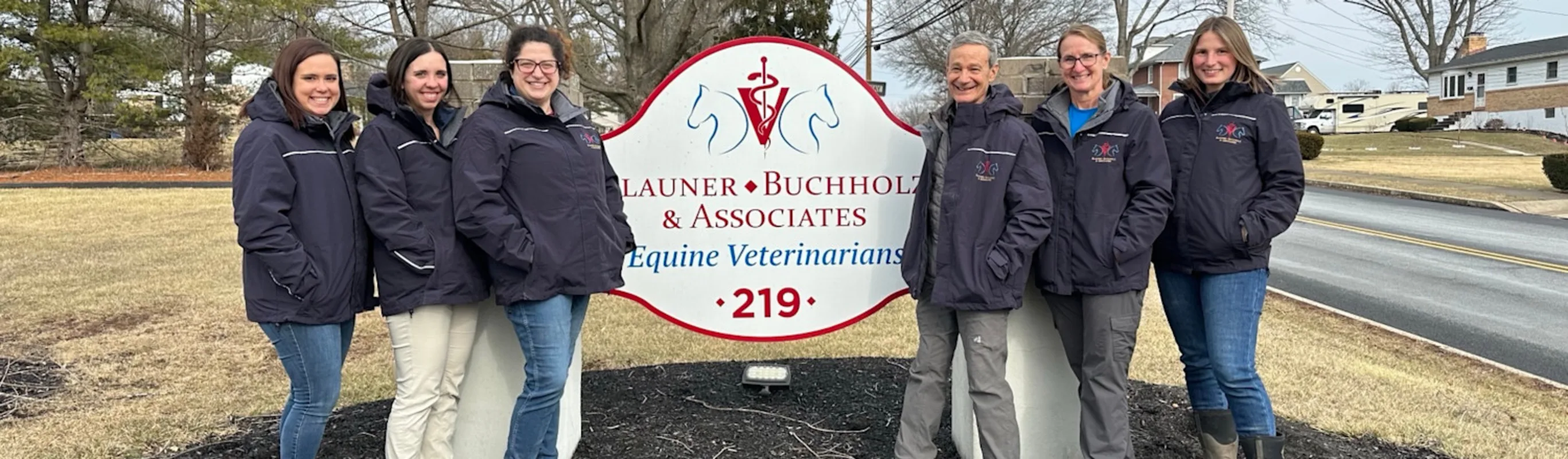 Equine athlete jumping in puddle with horse Equine athlete jumping in puddle with horse