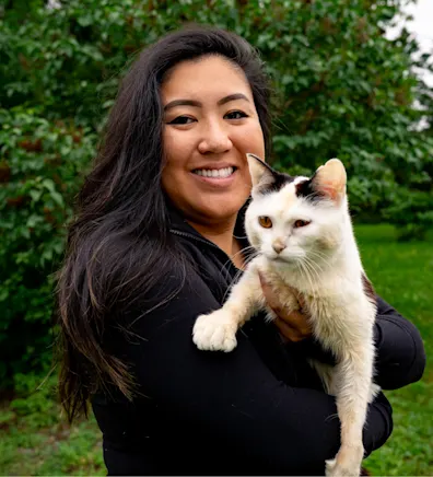Giselle Kan holding a dog Giselle Kan holding a dog