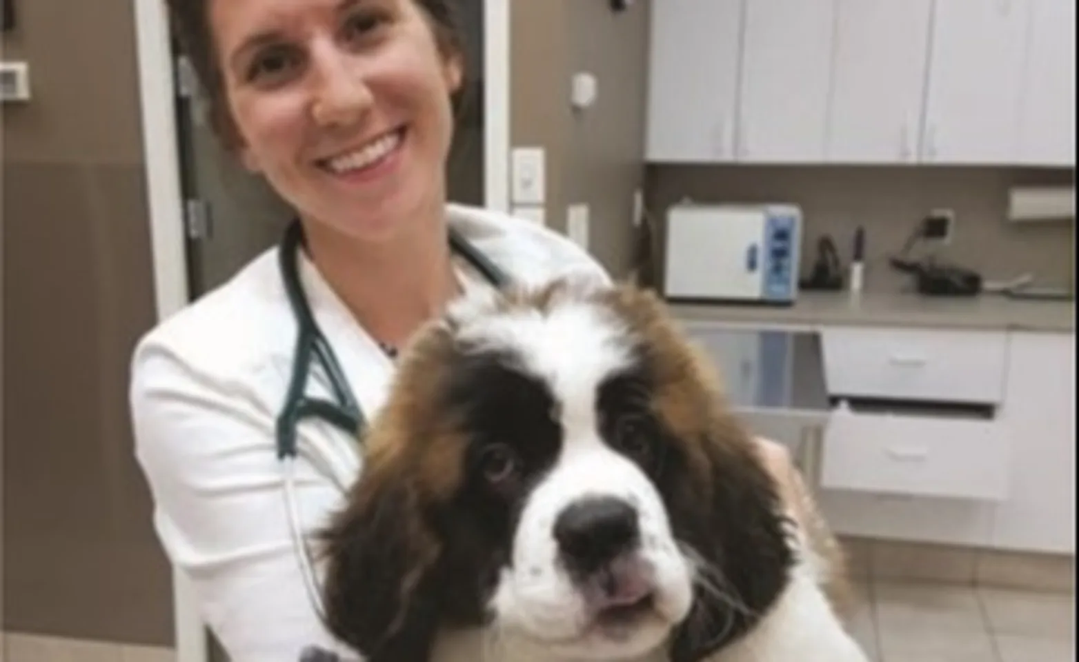 Dr. Dealia Anderson and a dog Dr. Dealia Anderson and a dog