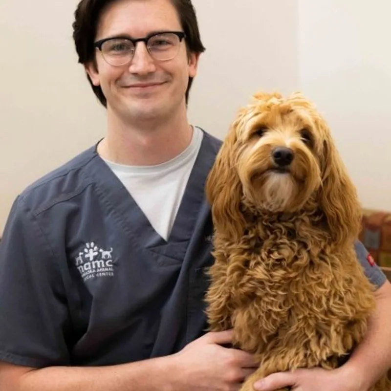 Dr. Becker and dog. Dr. Becker and dog.