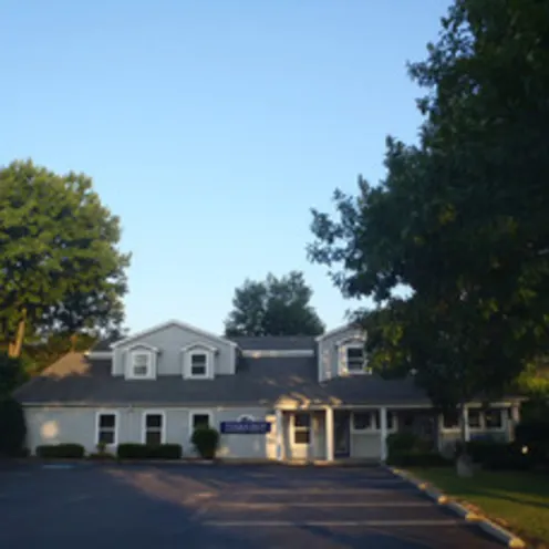 Poquoson Veterinary Hospital Front Exterior of the building with a nice clean cut lawn and lush trees surrounding it. Poquoson Veterinary Hospital Front Exterior of the building with a nice clean cut lawn and lush trees surrounding it.