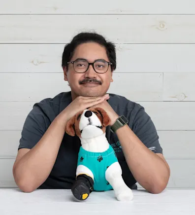 Leon with a stuffed dog Leon with a stuffed dog