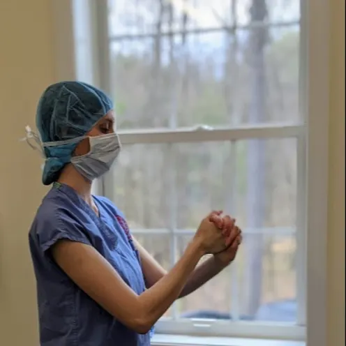 Veterinarians preparing for surgery Veterinarians preparing for surgery