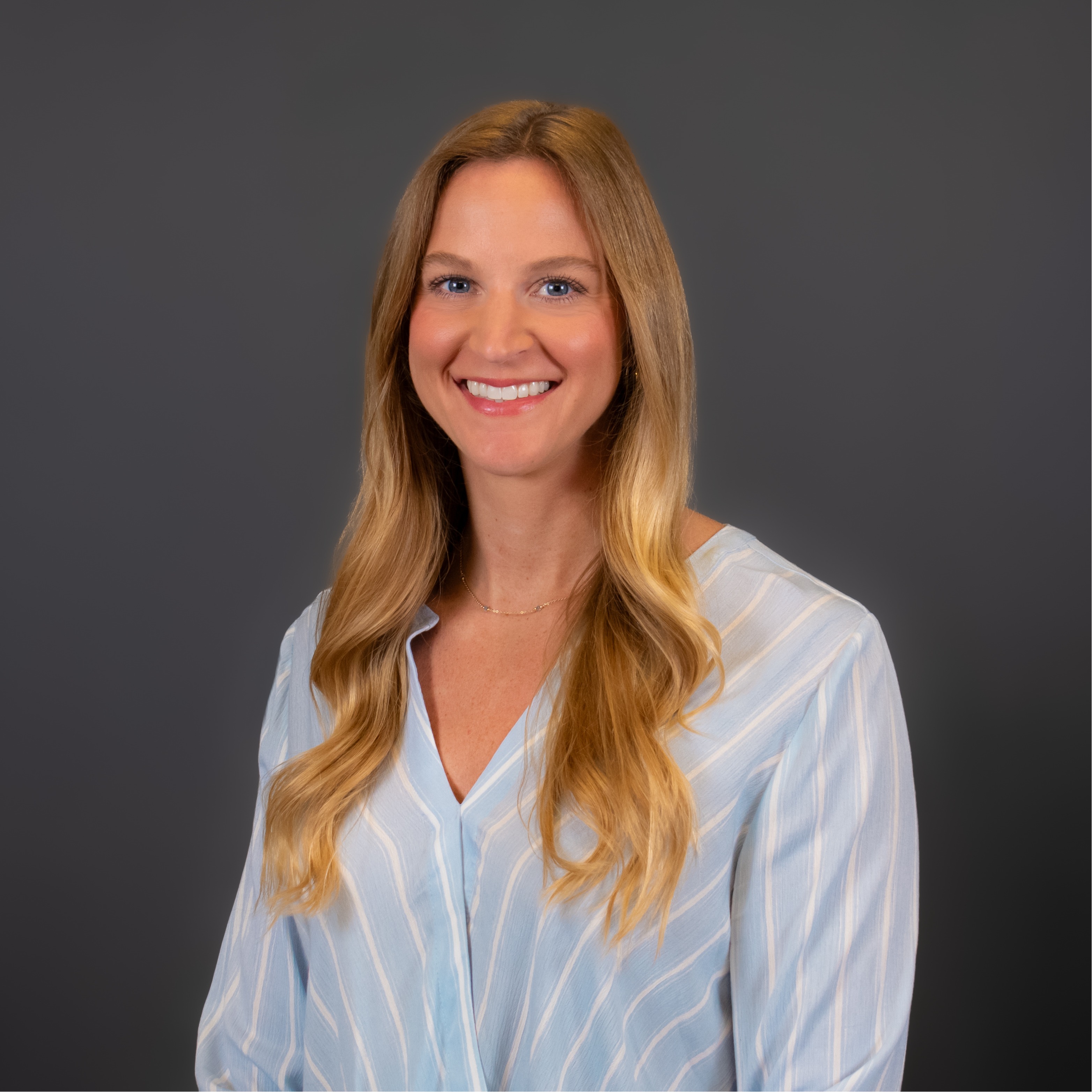 Dr. Sundby smiling for a photo