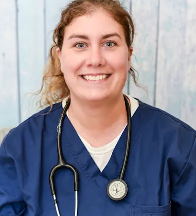 Natalie holding a pet Natalie holding a pet