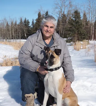 Ana in the snow with a dog Ana in the snow with a dog