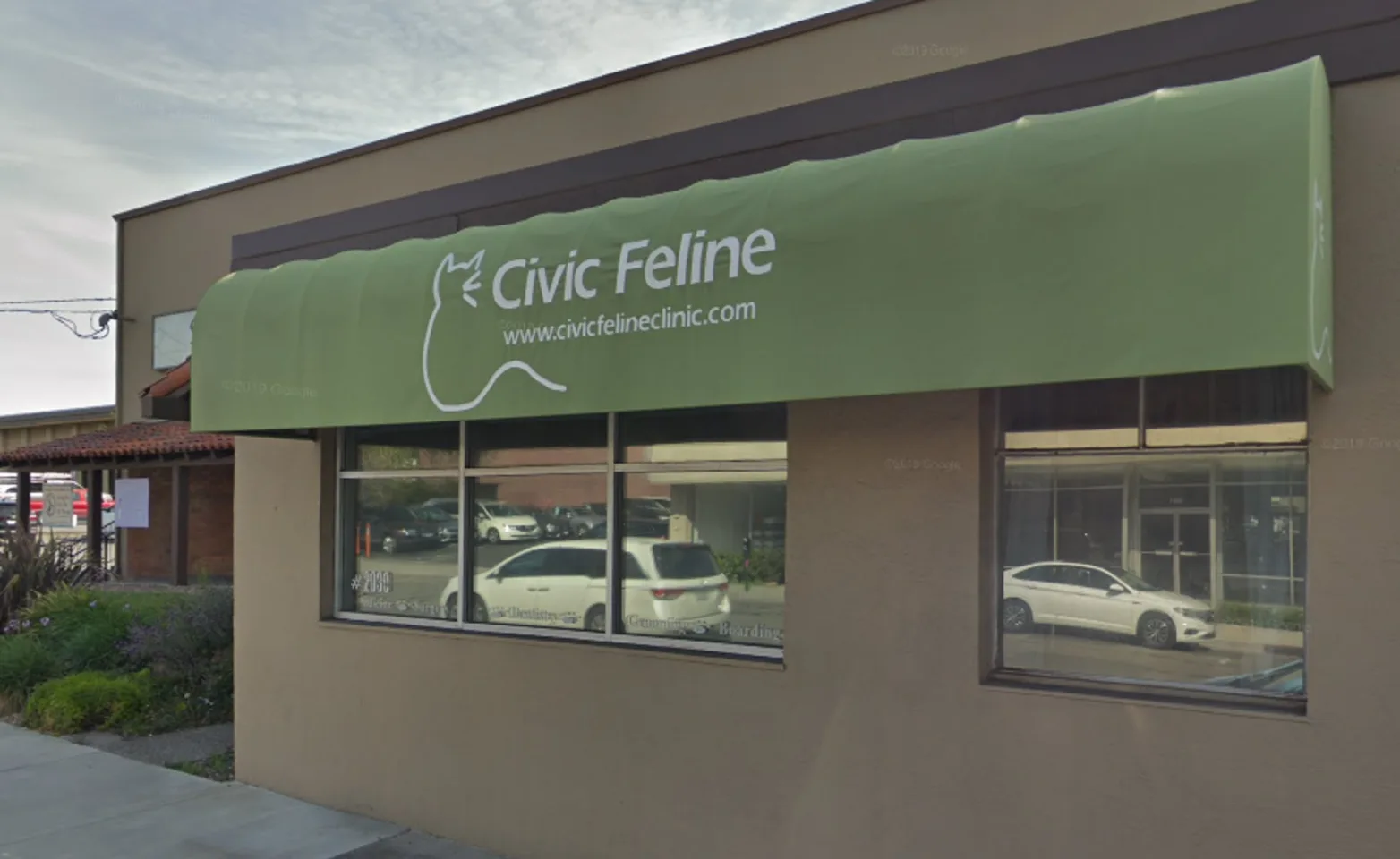Exterior with green overhanging awning at Civic Feline Clinic
