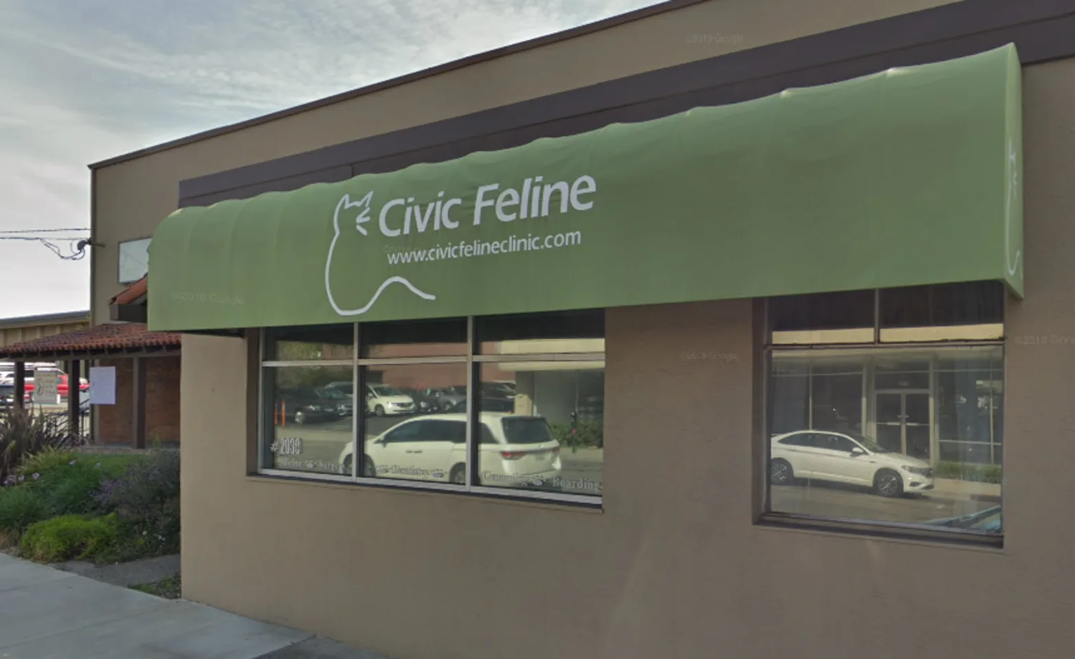 Exterior with green overhanging awning at Civic Feline Clinic Exterior with green overhanging awning at Civic Feline Clinic