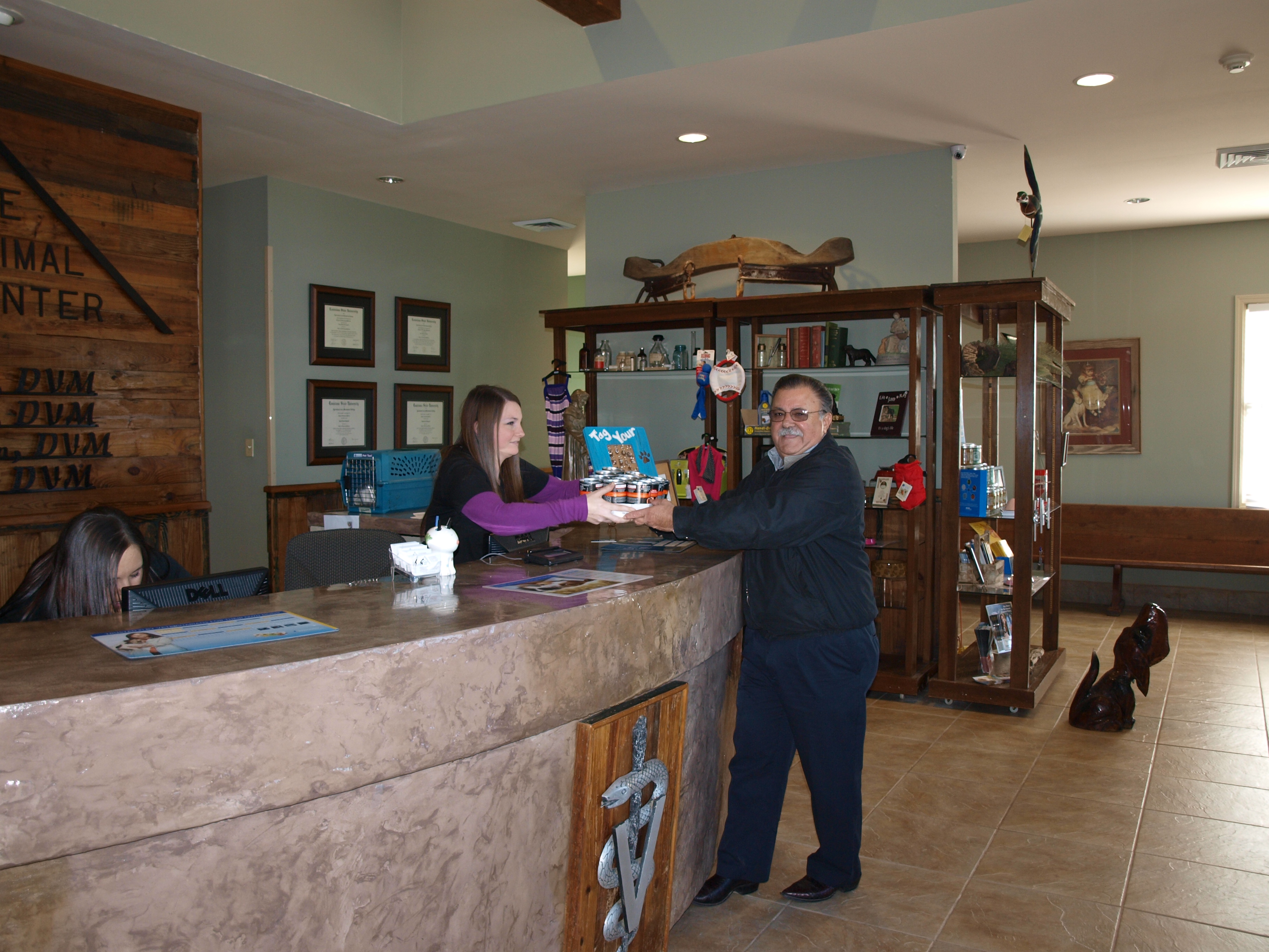 client at front desk