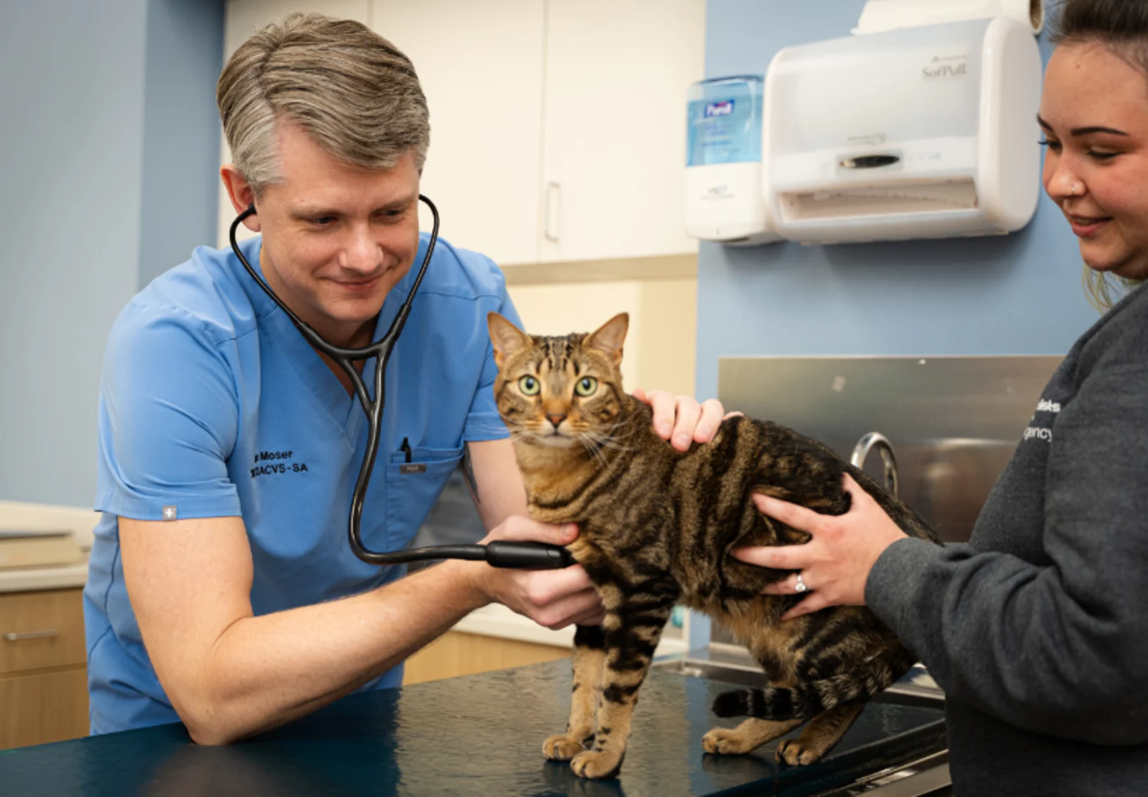 Dr. Moser with cat Dr. Moser with cat