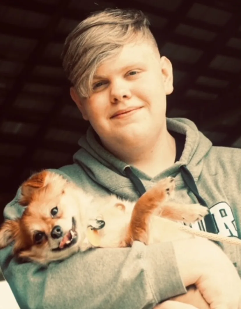 Clayton with pomeranian