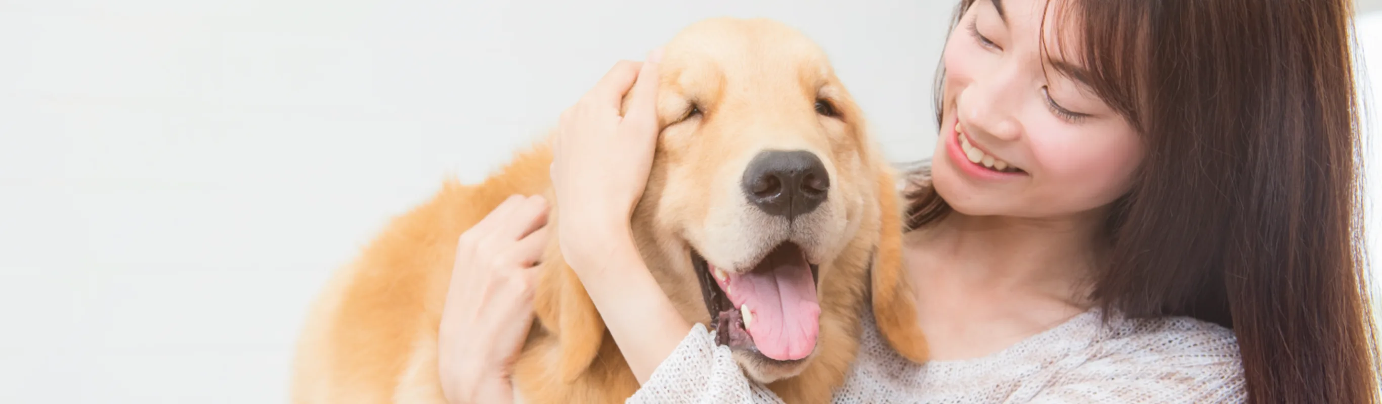 Woman hugging dog