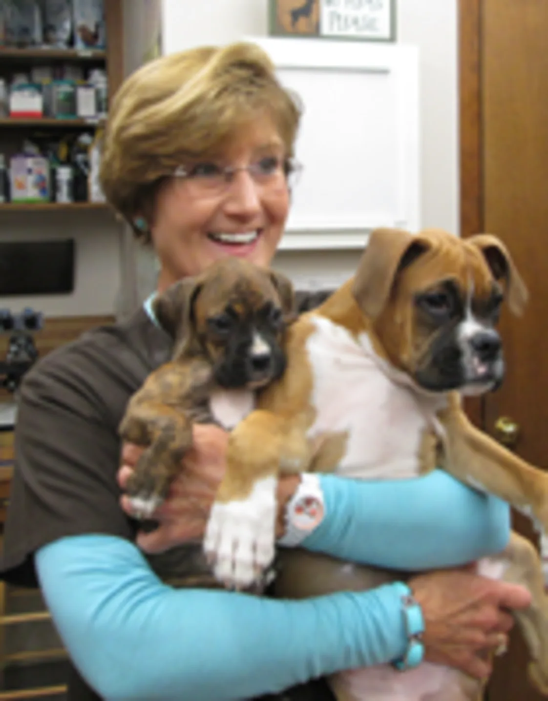 Debbie holding 2 dogs Debbie holding 2 dogs