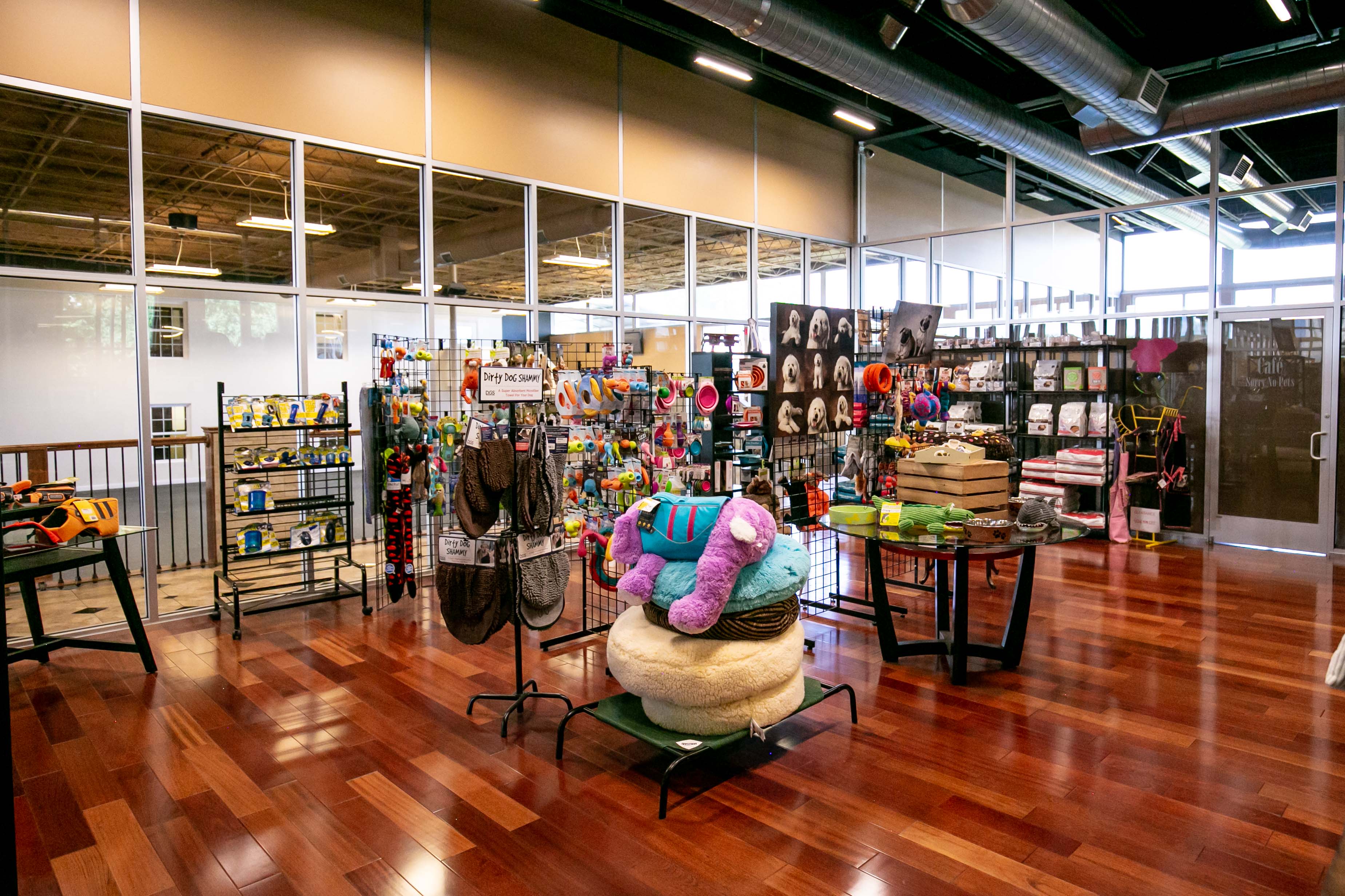 Uptown Hounds Retail Store filled with toys and pet supplies. 