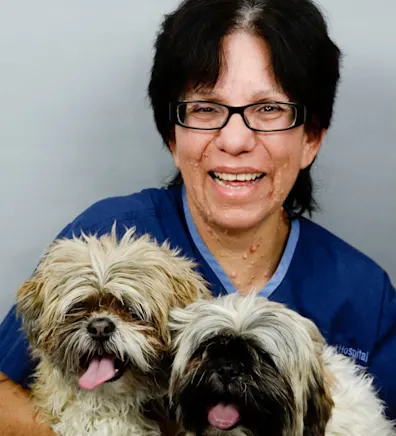 Elena with two dogs at Rainbow Animal Hospital Elena with two dogs at Rainbow Animal Hospital