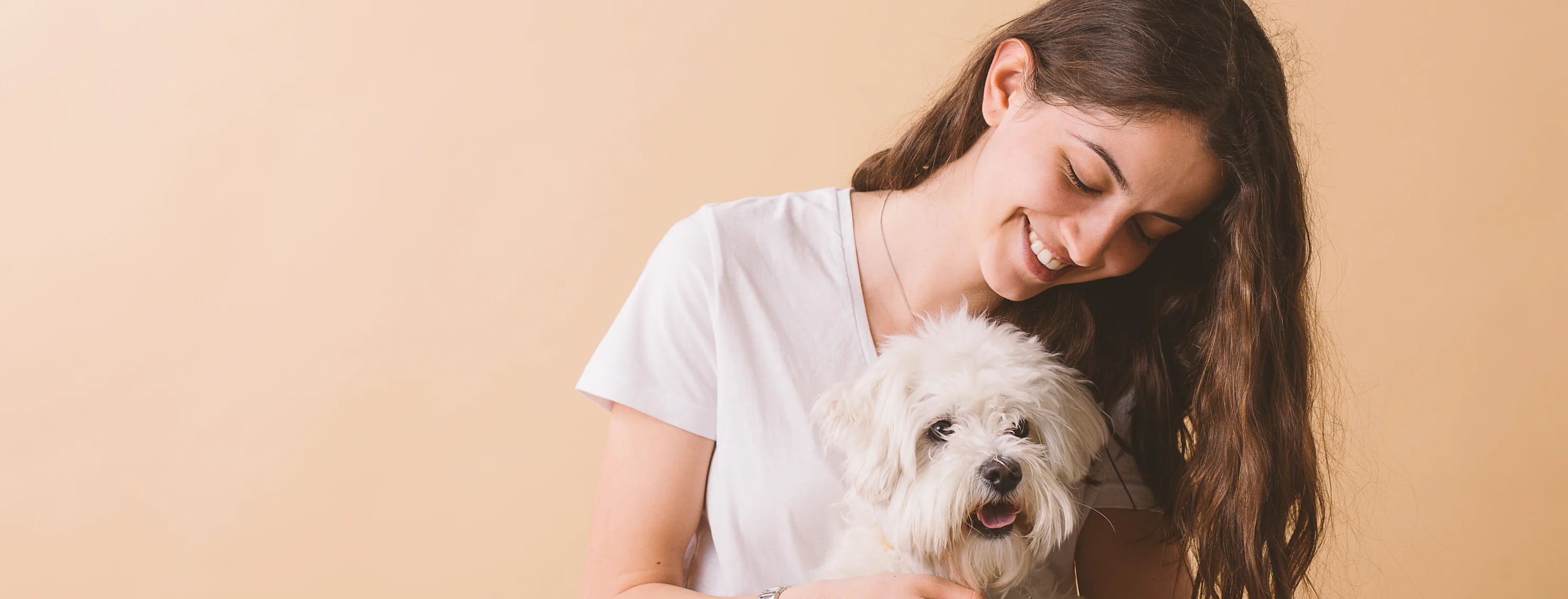 Woman sitting with dog.