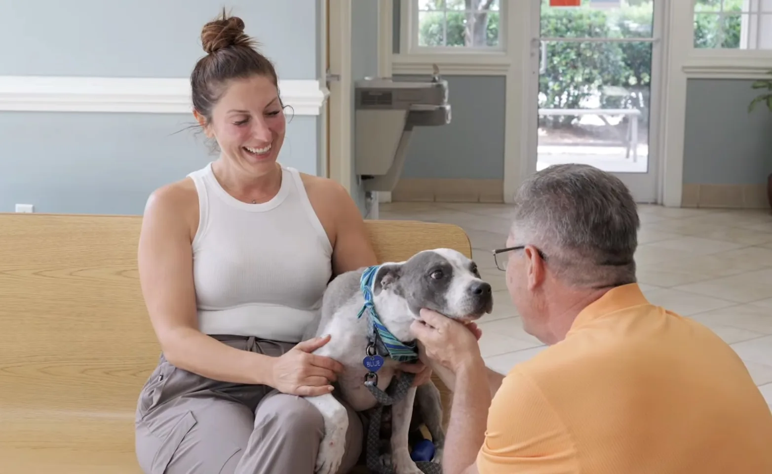 Vet and owner with dog Vet and owner with dog