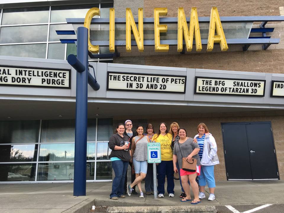 AESC staff in front of cinema